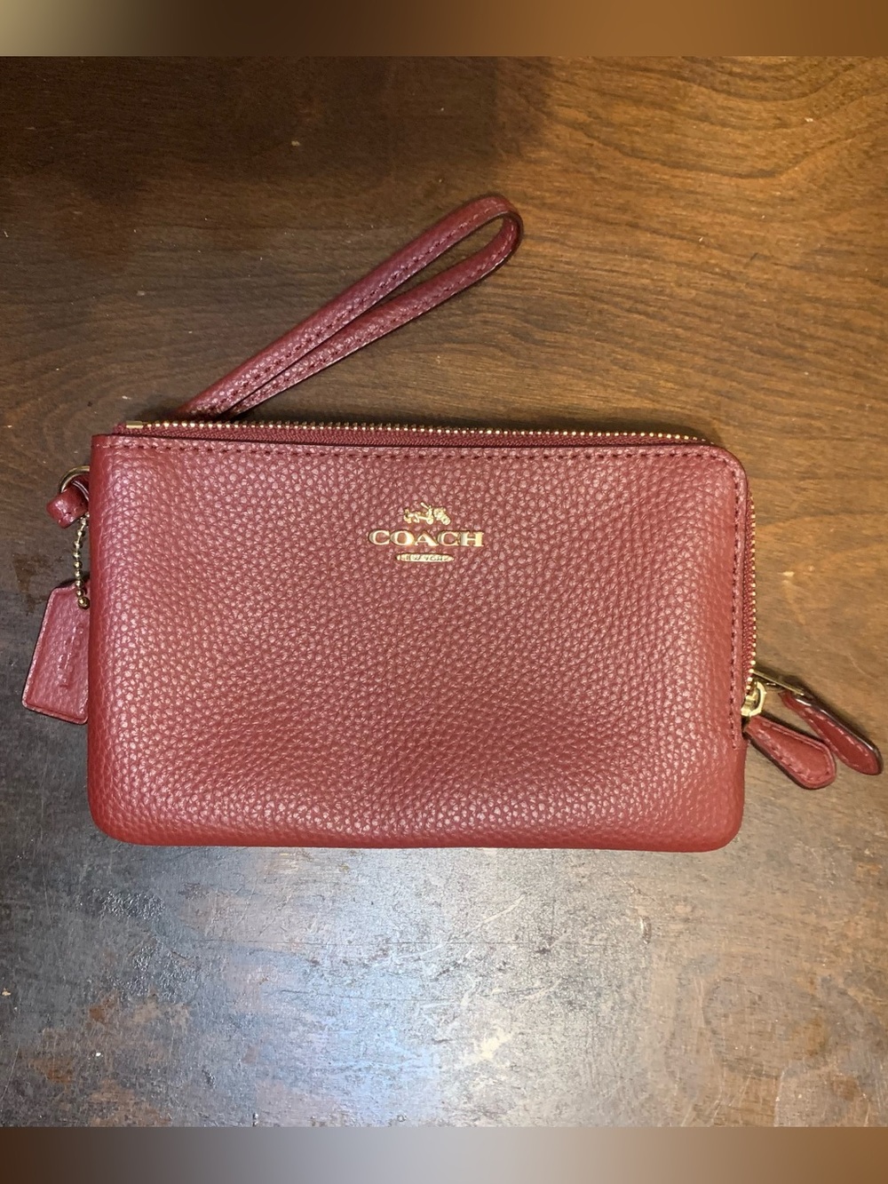 *Like New* - Coach maroon wristlet H1781 F87590